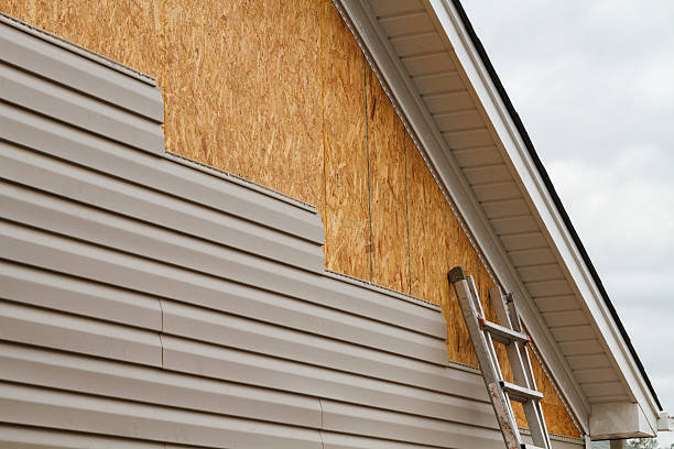 Professional Vinyl Siding technician working in Wyncote, PA